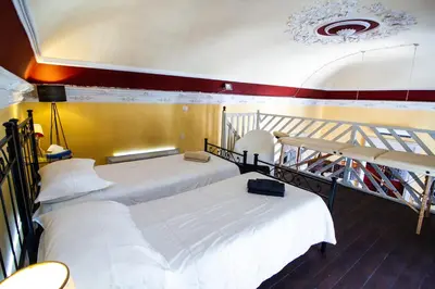 Letto o letti in una camera di Le Muse Catanesi