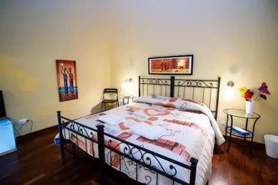 Letto o letti in una camera di Le Muse Catanesi
