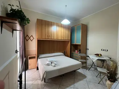 Letto o letti in una camera di Casa del giglio