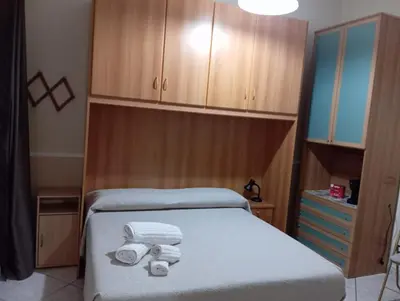 Letto o letti in una camera di Casa del giglio