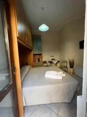 Letto o letti in una camera di Casa del giglio