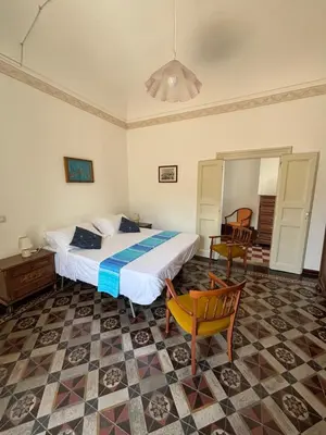 Letto o letti in una camera di CasAmuri