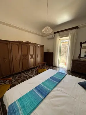 Letto o letti in una camera di CasAmuri