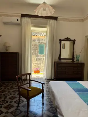 Letto o letti in una camera di CasAmuri