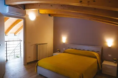 Letto o letti in una camera di Casa Vacanze Robinson