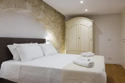 Letto o letti in una camera di Ortigia's Bridge Apartment - 2 minutes from the center