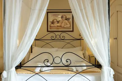 Letto o letti in una camera di Ortigia Stone's Loft Spa