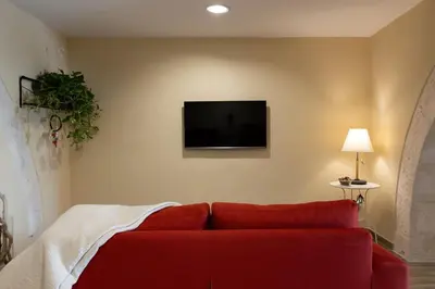 Letto o letti in una camera di Ortigia Stone's Loft Spa