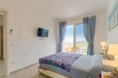 Letto o letti in una camera di Marzamemi Holidaydream Sea View