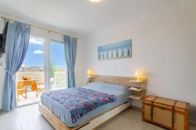Letto o letti in una camera di Marzamemi Holidaydream Sea View