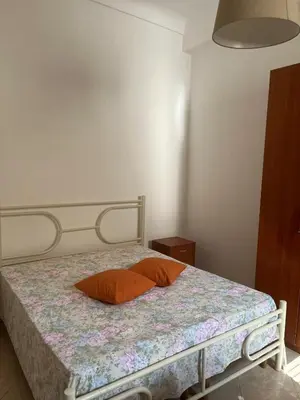 Letto o letti in una camera di Polina Maison