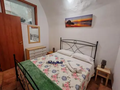 Letto o letti in una camera di Casa Carmela 53 by Holiday World