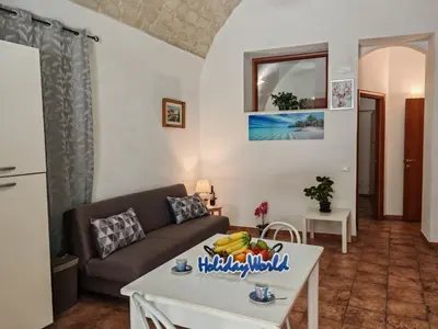 Area soggiorno di Casa Carmela 53 by Holiday World