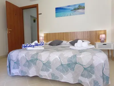 Letto o letti in una camera di Casa Ragusa 59 by Holiday World