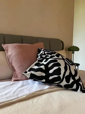 Letto o letti in una camera di B&B Monstera SicilianExperience