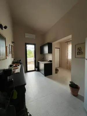 TV o dispositivi per l'intrattenimento presso B&B Monstera SicilianExperience