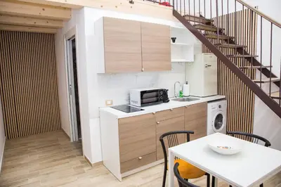 Cucina o angolo cottura di 3 Rooms Catania - Madeira bright loft cozy quiet independent