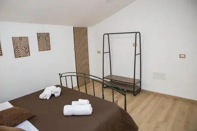 Letto o letti in una camera di 3 Rooms Catania - Madeira bright loft cozy quiet independent