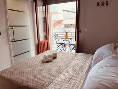 Letto o letti in una camera di Colombo Rooms