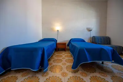 Letto o letti in una camera di Arenella Sky and Sea