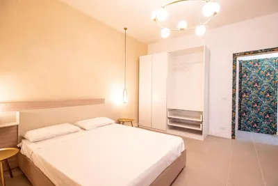 Letto o letti in una camera di Casa Amelia