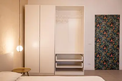 Letto o letti in una camera di Casa Amelia