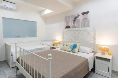 Letto o letti in una camera di Sikania Stay by Wonderful Italy
