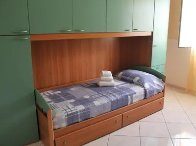Letto o letti in una camera di Casa Vacanze Primavera