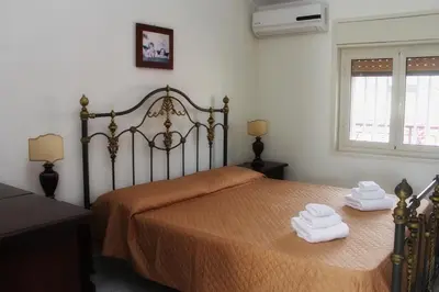 Letto o letti in una camera di Casa Vacanze Primavera