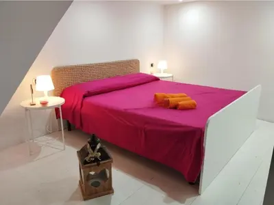 Letto o letti in una camera di The Cordari House
