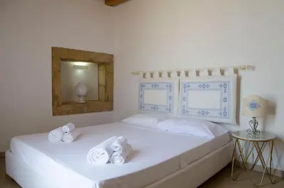 Letto o letti in una camera di La casa della Tonnara, Marzamemi