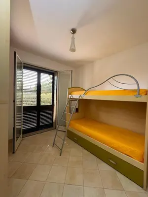 Letto o letti in una camera di Residence Orange