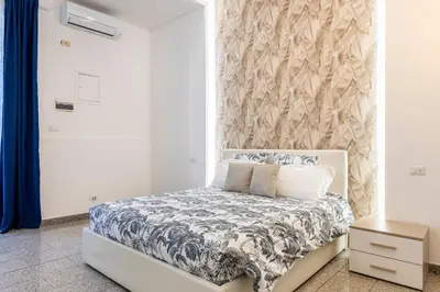 Letto o letti in una camera di Elevincens Home