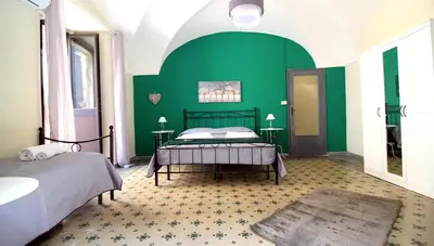 Letto o letti in una camera di Catania Flavours