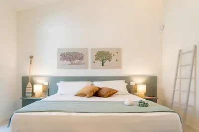 Letto o letti in una camera di Villa Alice by Ortigiaapartments
