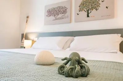 Letto o letti in una camera di Villa Alice by Ortigiaapartments