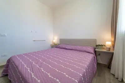 Letto o letti in una camera di GuestHost - Borgo 84 Marzamemi - Hermes Apartment