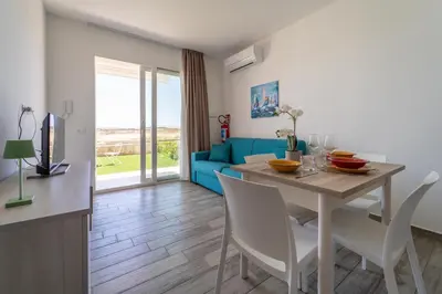 Area soggiorno di GuestHost - Borgo 84 Marzamemi - Hermes Apartment