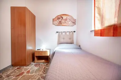 Letto o letti in una camera di Casa Sauro 10