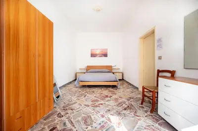 Letto o letti in una camera di Casa Sauro 10