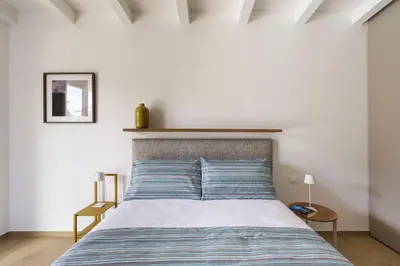 Letto o letti in una camera di Villa Malva