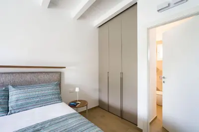 Letto o letti in una camera di Villa Malva