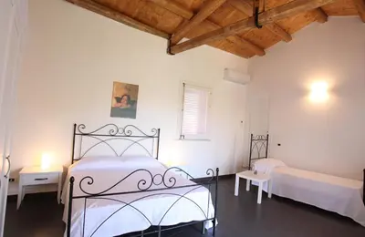 Letto o letti in una camera di Reusia Holiday Home