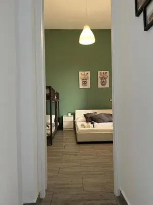 Letto o letti in una camera di House Victoria casa vacanze per 8 persone a Noto