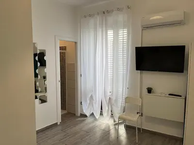 TV o dispositivi per l'intrattenimento presso House Victoria casa vacanze per 8 persone a Noto