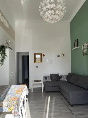 Area soggiorno di House Victoria casa vacanze per 8 persone a Noto