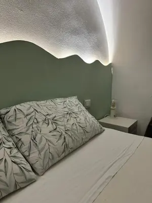 Letto o letti in una camera di Spazio Apartments Fornai