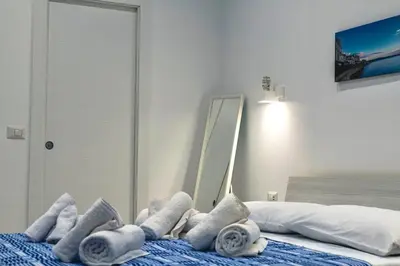 Letto o letti in una camera di Moni House Ortigia