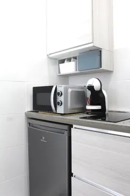 Cucina o angolo cottura di Moni House Ortigia