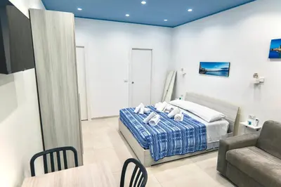 Letto o letti in una camera di Moni House Ortigia